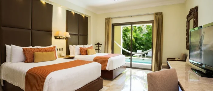 Dreams Tulum Resort & Spa Guest Room Guest room with two beds and a terrace at Dreams Tulum Resort & Spa